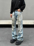 Tryess- Ink-splashed Flared Jeans