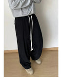 Tryess- Relaxed Fit Pleated Drawstring Pants