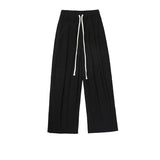 Tryess- Relaxed Fit Pleated Drawstring Pants