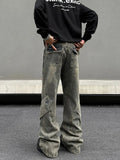 Tryess- Yellow Mud Flared Distressed Jeans